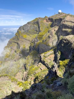PR1 hiking trail with a view of the radar station on Pico Arieiro, Madeira, Portugal