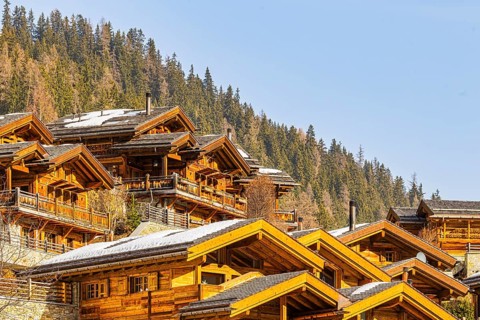Snow-covered roofs, modern wooden holiday homes, Grimentz, Val d'Anniviers, Valais Alps, Canton of