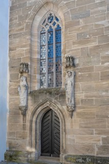 Two figures of saints on the side portal of the baroque Church of the Holy Spirit, Weißenburg,