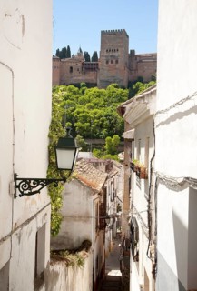 Narrow alleyway named Candil in the Moorish housing district of Albaicin, Granada, Spain