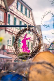 Easter wreath with bunny decoration in front of a traditional half-timbered house, Calw, Black