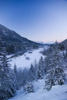 Isar valley in winter at temperatures of minus 18 degrees Celsius. Snow covered landscape with the