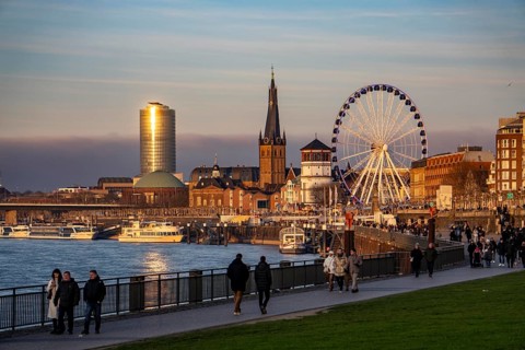 Rhine promenade in Düsseldorf, Ferris wheel, old castle tower, St. Lambert Basilica, old town, ERGO