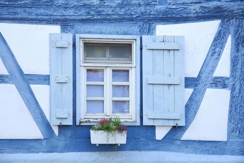Blue window with shutters and flower decoration, flower pot, idyll, Steinheim, Hanau, Hesse,