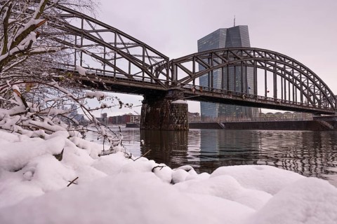 Snow lies along the banks of the Main from the European Central Bank (ECB) to the Frankfurt banking