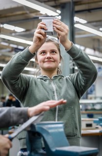 Remscheid, North Rhine-Westphalia, Germany - Trainee woman in metalworking here a materials tester