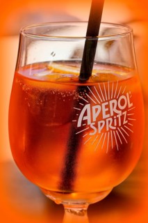 A glass of Aperol Spritz, drink, glass, straw, liqueur with Prosecco, alcohol, studio, Austria