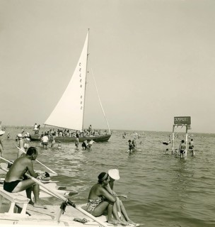 Historical photo summer 1961, tourists, beach, Rimini, Italy