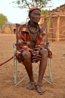 Chief Hikuminue Kapika, chief of the Namibian Himba, in his kraal, Omuramba, Kaokoland, Kunene,