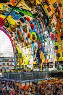 Markthal from 2014, offers over 100 food stalls and delicatessens with spectacular ceiling fresco
