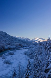 Isar valley in winter at temperatures of minus 18 degrees Celsius. Snow covered landscape with the
