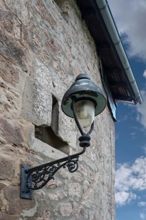 Historic street lamp on an old building, Kulmbach, Upper Franconia, Bavaria, Germany