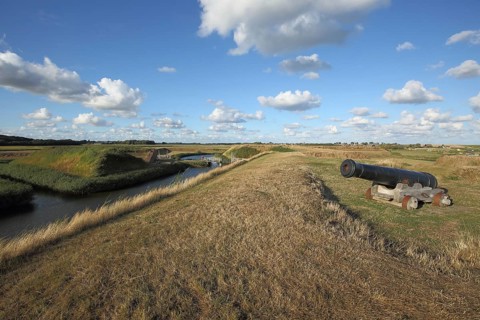 Fortress with medieval cannon on dam with moat, Wall, Fort de Schans, Texel, North Holland,