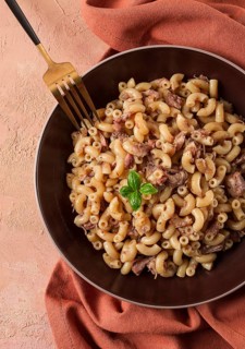 Pasta with stewed meat, pasta in the navy, horns, homemade, no people