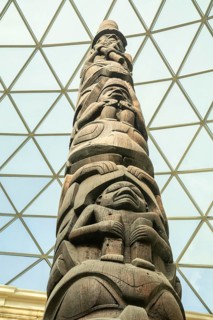 Wooden figures, detail of totem pole from 1850 in British Columbia, Canada in British Museum,