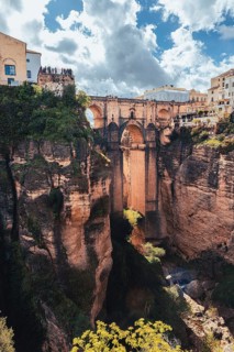 The imposing Puente Nuevo bridge in Ronda that spans a deep gorge, Ronda, Spain