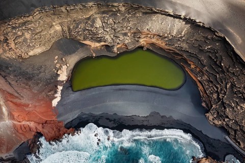 Stunning aerial shot of Los Clicos Beach on Lanzarote, showcasing the striking contrast between the