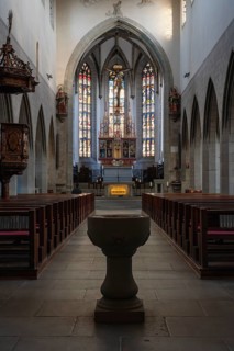 Interior view of the Radolfzell Cathedral of Our Lady with the baptismal font and the neo-Gothic