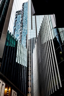 Modern abstract reflections in glass fronted office buildings in the financial district of the