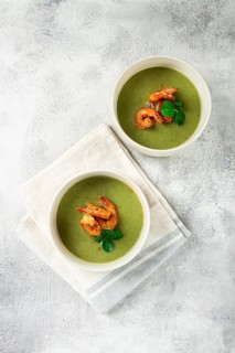 Pea cream soup, with shrimp, green soup, homemade, top view, no people