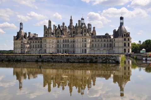 Castle Chateau de Chambord with the pond in France
