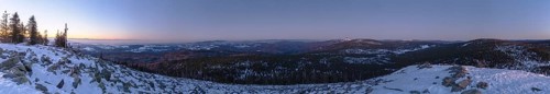 View from Mount Lusen over the hills of the bavarian forest at sunrise in winter, Bavaria, Germany