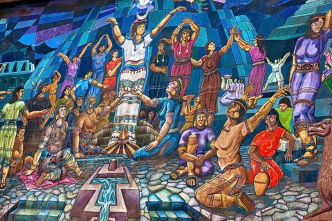 Vivid wall painting with scenes of a traditional celebration, rich in colors and moving figures,