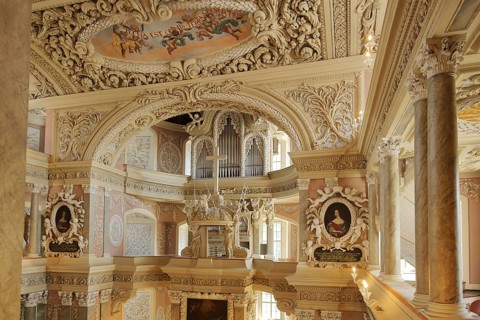 Magnificent baroque St. Trinity church, decorations, frescoes, handicrafts, interior view, castle