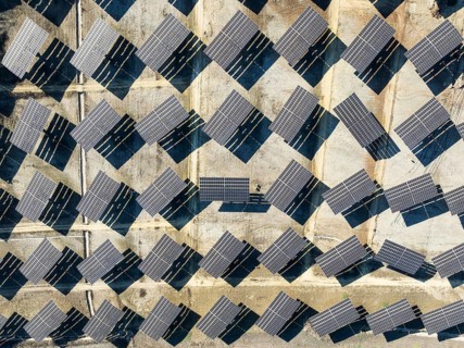 Rows of solar panels at a photovoltaic plant near Vejer de la Frontera. Aerial view. Drone shot.