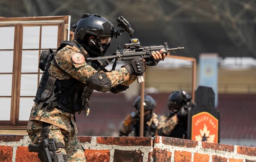 Commandos of the Central Reserve Police Force (CRPF) simulate a counter-terrorist hostage rescue