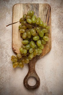 A branch of white grapes, wine grapes, Georgian grape variety Rkatsiteli, top view