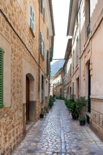 Narrow alley in Sòller, Majorca, Spain