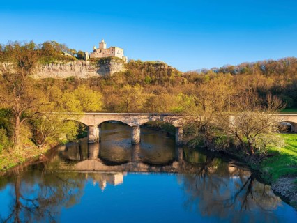 The ruins of Rudelsburg Castle and the bridge over the Saale in spring, Saale Valley near Bad