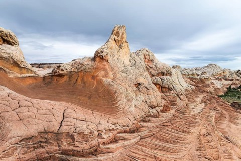 Unique geological formations dominate the landscape at White Pocket, Arizona, showcasing intricate