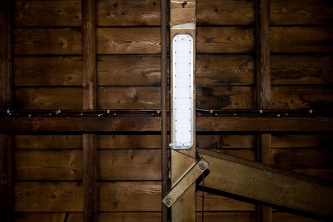 LED lamp on a steel girder in an industrial plant