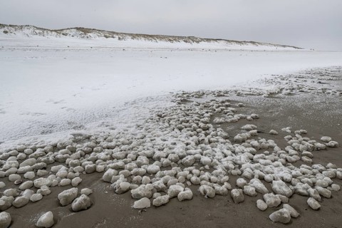 Snow-covered dunes on the North Sea beach, Langeoog, Lower Saxony, Germany