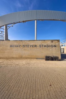 Heinz-Steyer-Stadion, stadium, side entrance, concrete building, roof construction, deep blue sky