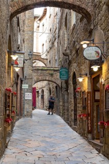 Typical street in the historic centre of Volterra, province of Pisa, Tuscany, Italy