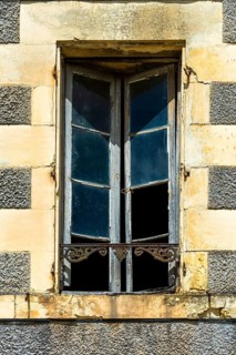 Open window in an abandoned building. Nevers. Nievre departement. France