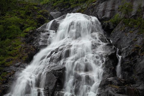 Summer day visiting Espelandsfossen falls near Bergen, scenic nature and flowing water, Vestland,