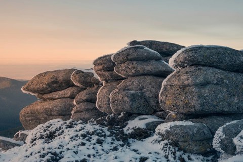 Captivating view of snow-dusted rock formations in Siete Picos, located in the scenic Guadarrama