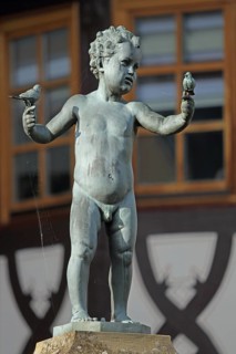 Sculpture Boy with two bird figures holding hands by Emil Cauer 1938, putto, heraldic animal,