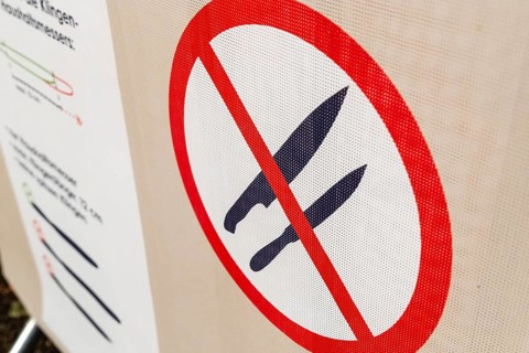 Pictogram with knife and weapons ban at an event in Düsseldorf, Germany
