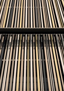 Top view of contemporary geometric building with geometric lines and stripes