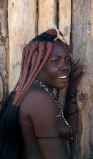 Traditional Himba woman, portrait, near Opuwo, Kaokoveld, Kunene, Namibia