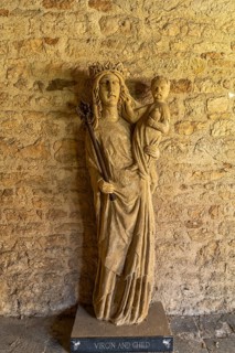 Statue of the Virgin and Child in the cloisters of New College, University of Oxford, Oxfordshire,