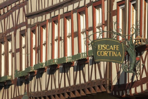 Nose sign of half-timbered house Eiscafe Cortina, inscription, ice cream parlour, window row,