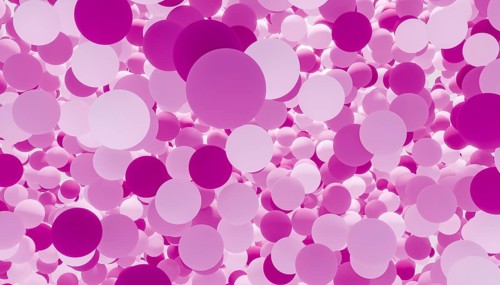 This image showcases an array of 3D rendered balls in multiple shades of purple, beautifully
