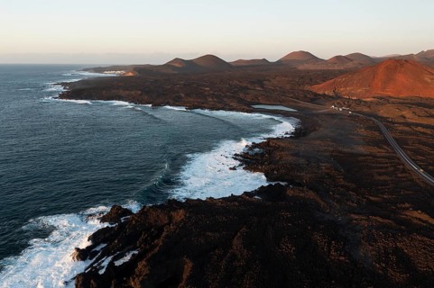 Aerial photograph capturing the dramatic landscape of Los Hervideros with its volcanic terrain and