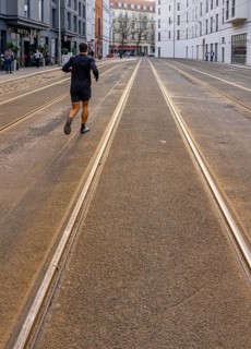 Public transport strike, lonely jogger on Große Präsidenternstraße where the tram terminal is